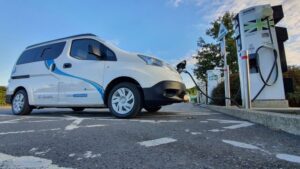 EV campervan at a public charge point