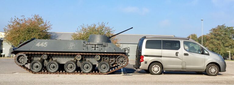 Bovington Tank parked behind a campervan