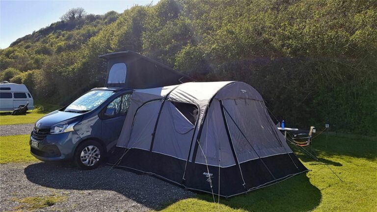black campervan with tent extension