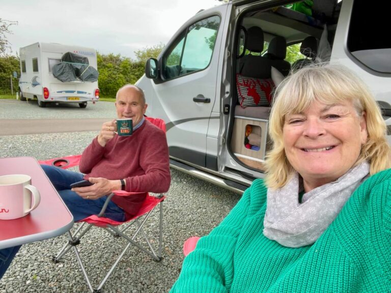 Paula and Reg with their campervan named Ruby